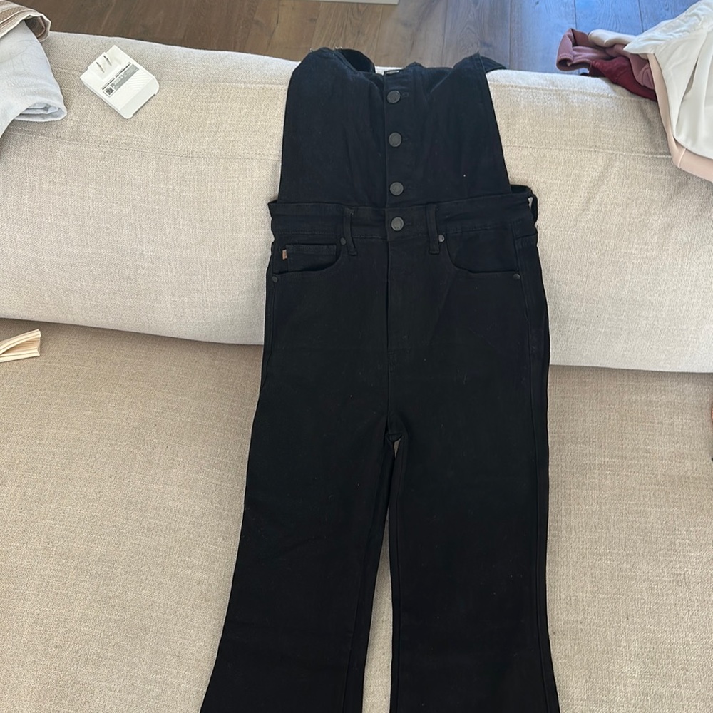 Black overalls with tummy control and flat bottoms. So cute on, stretchy.